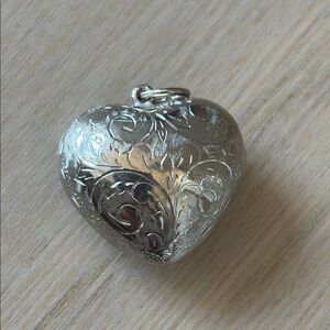 Elegant Silver Heart Pendant